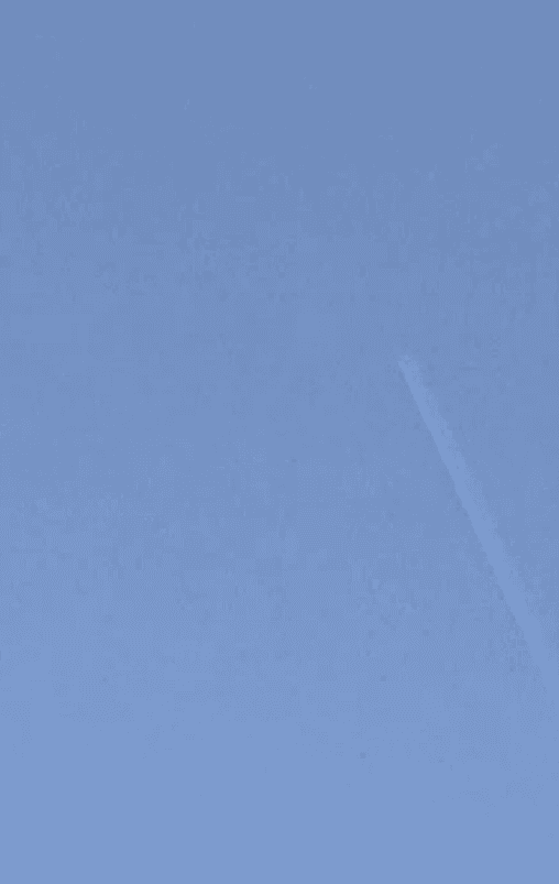 Raw sky photo showing a jet contrail