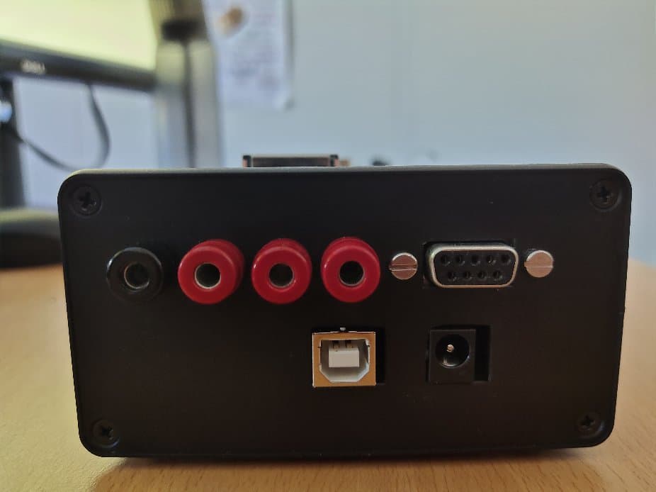 Rear panel of the finished box with banana jacks, D-sub, USB and 12 V connectors