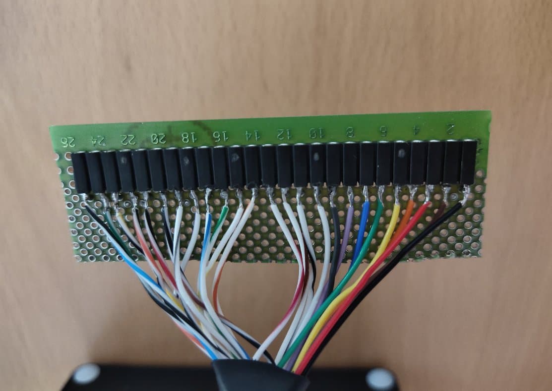 The 25-pin test adapter with resistors plugged between pin sockets